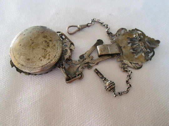 Pocket watch with chatelaine. Silver plated metal. Key-wind. 19th century