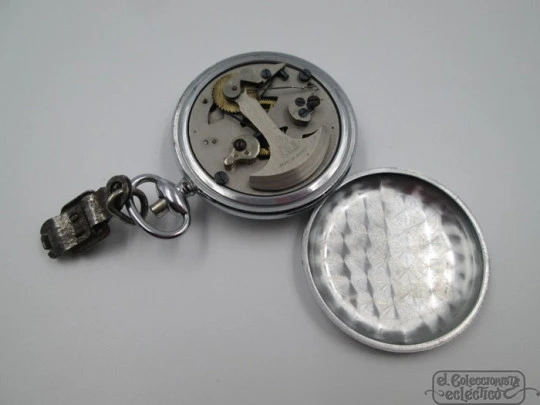 Podómetro francés de bolsillo. Metal plateado. 1930. Cien mil pasos