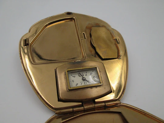 Polvera art decó con reloj. Illinois Watch Case Co. Weldwood. Metal dorado. EEUU. 1930