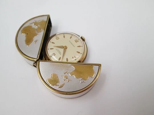 Poresa 'World map' travel watch. Silver plated and golden. Manual wind. 1960's