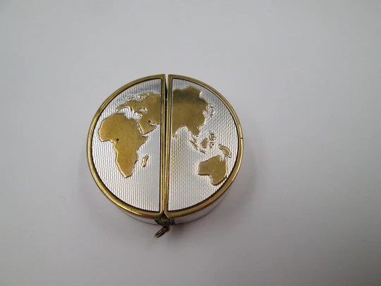 Poresa 'World map' travel watch. Silver plated and golden. Manual wind. 1960's