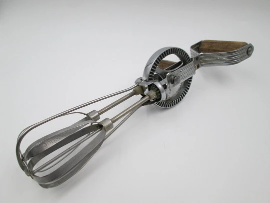 Prestige egg beater / wire whisk. England. 1940's. Steel and wood