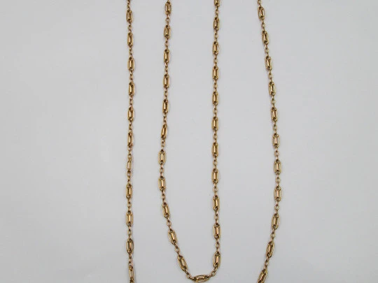 Pretty fan long chain. Gold plated metal. Braided oval links. 1940's. Europe