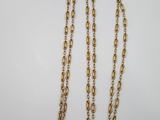 Pretty fan long chain. Gold plated metal. Braided oval links. 1940's. Europe