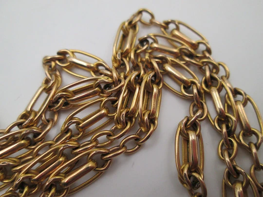 Pretty fan long chain. Gold plated metal. Braided oval links. 1940's. Europe