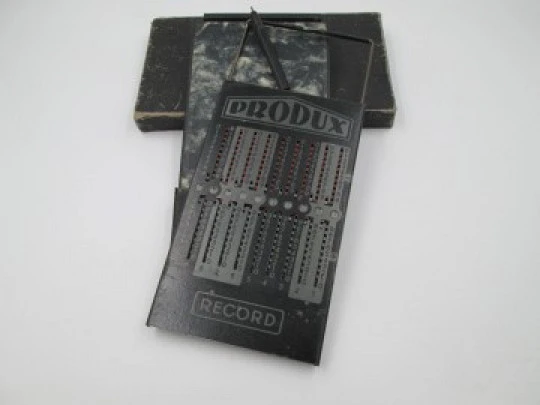Produx Record pocket mechanical calculator. 1950s. Germany. Folder