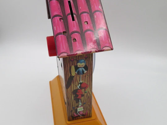 Puck children's musical clock with money box. Lithographed tinplate & plastic. Rico. 1970's