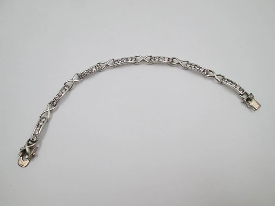 Pulsera articulada mujer eslabones alternos. Plata de ley y gemas blancas. Europa. 1990