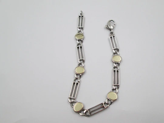 Pulsera articulada mujer. Plata ley y laminados oro. Óvalos y rectángulos calados. 1960