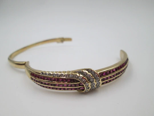 Pulsera de pedida. Oro amarillo 18k, rubíes talla baguette y diamantes