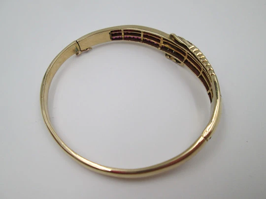 Pulsera de pedida. Oro amarillo 18k, rubíes talla baguette y diamantes