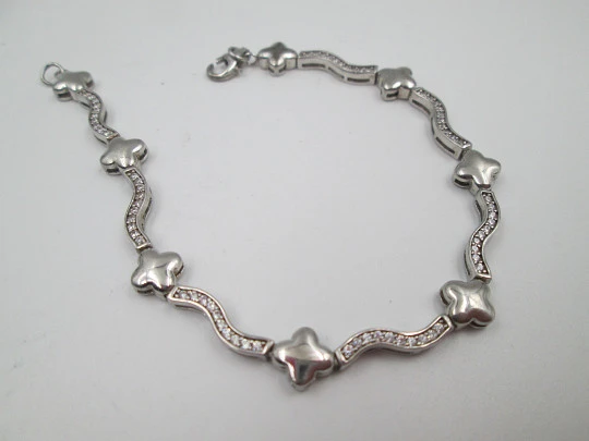 Pulsera para mujer en plata de ley. Motivos de estrellas y pedrería blanca. 1990. Europa