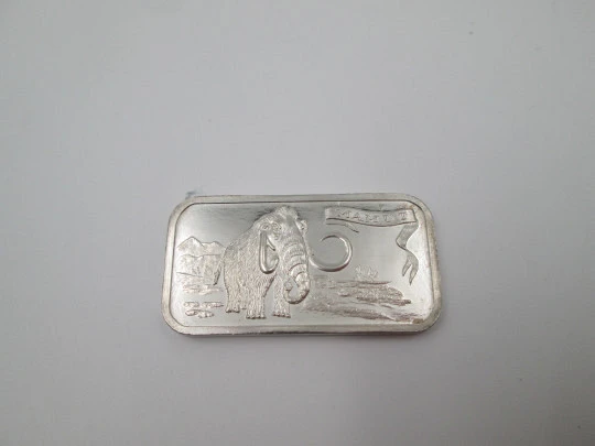 Pure sterling silver ingot. Prehistoric mammoth relief scene. Spain. 1980's