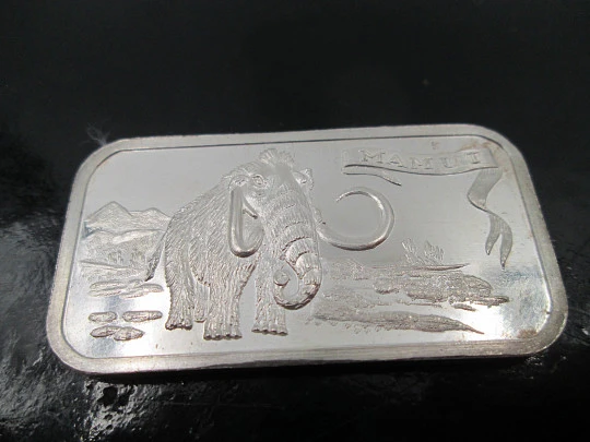 Pure sterling silver ingot. Prehistoric mammoth relief scene. Spain. 1980's