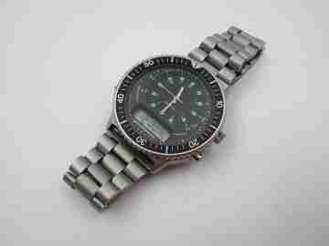 Quartz analog digital chronograph. Titanium and steel. Bracelet. Japan