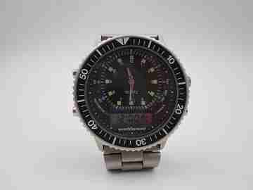 Quartz analog digital chronograph. Titanium and steel. Bracelet. Japan
