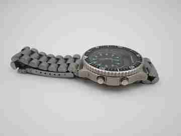 Quartz analog digital chronograph. Titanium and steel. Bracelet. Japan