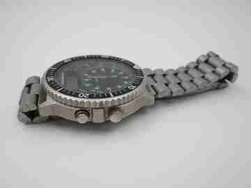 Quartz analog digital chronograph. Titanium and steel. Bracelet. Japan