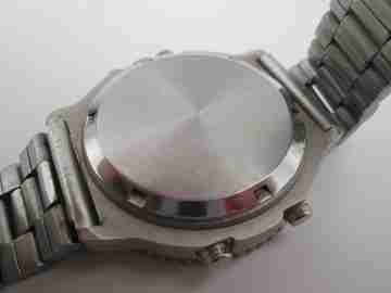 Quartz analog digital chronograph. Titanium and steel. Bracelet. Japan