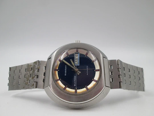 Radiant Blumar. Acero. Caja elíptica. Automático. Calendario. Brazalete. 1970