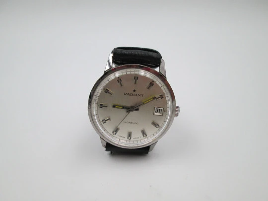 Radiant. Chrome metal and steel. Manual wind. 1970's. Calendar. Strap