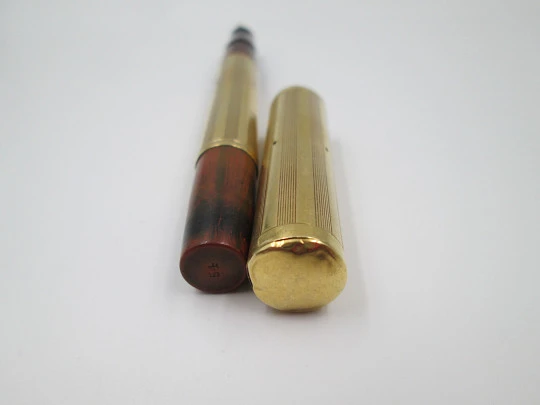 Rara estilográfica Waterman's Ideal 54. Ebonita roja veteada y oro amarillo 18 quilates