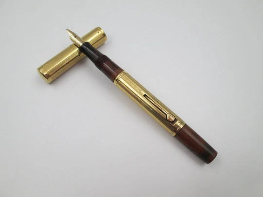 Rara estilográfica Waterman's Ideal 54. Ebonita roja veteada y oro amarillo 18 quilates