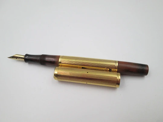 Rara estilográfica Waterman's Ideal 54. Ebonita roja veteada y oro amarillo 18 quilates