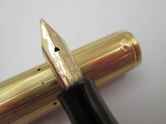 Rara estilográfica Waterman's Ideal 54. Ebonita roja veteada y oro amarillo 18 quilates