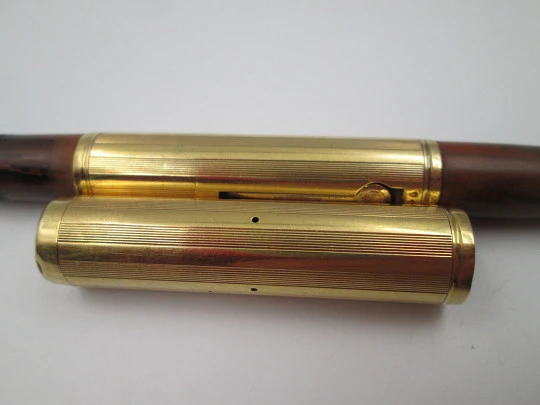 Rara estilográfica Waterman's Ideal 54. Ebonita roja veteada y oro amarillo 18 quilates
