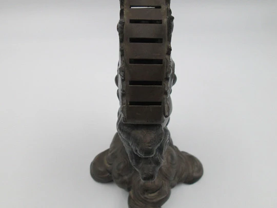 Rare figurative knife holder for table service. Double-faced child figure. Pewter. 1880's