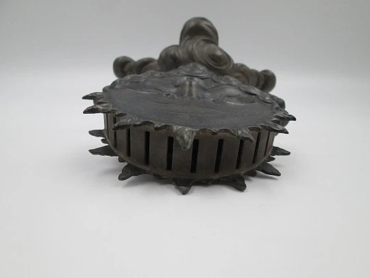 Rare figurative knife holder for table service. Double-faced child figure. Pewter. 1880's