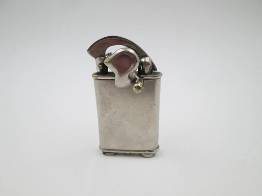 Rare lift arm petrol pocket lighter with crank started mechanism. Silver plated. 1930's