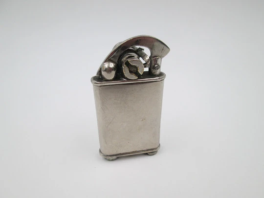 Rare lift arm petrol pocket lighter with crank started mechanism. Silver plated. 1930's