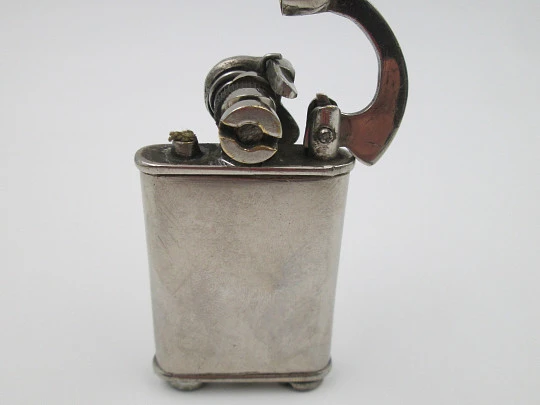 Rare lift arm petrol pocket lighter with crank started mechanism. Silver plated. 1930's