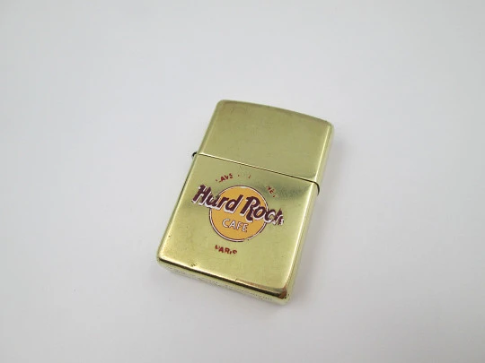 Rare Zippo Hard Rock petrol pocket lighter. High polished solid brass. United States. 1990's