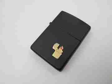 Rare Zippo petrol pocket lighter with relief motif. Black lacquer metal. USA. 1970's