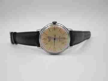 Record Geneve. Acero inoxidable. Cuerda manual. Correa piel. 1960. Suiza