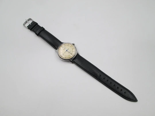 Record Geneve. Stainless steel. Manual wind. Leather strap. 1960's. Swiss