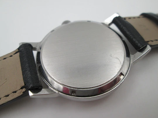 Record Geneve. Stainless steel. Manual wind. Leather strap. 1960's. Swiss