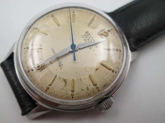 Record Geneve. Stainless steel. Manual wind. Leather strap. 1960's. Swiss