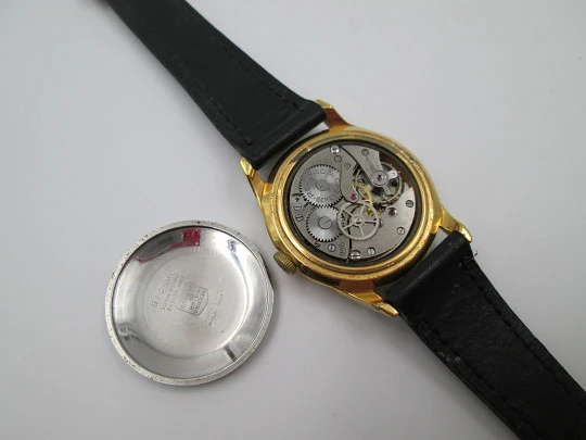 Record. Manual wind. 1960's. Steel & gold plated. Swiss. Leather strap