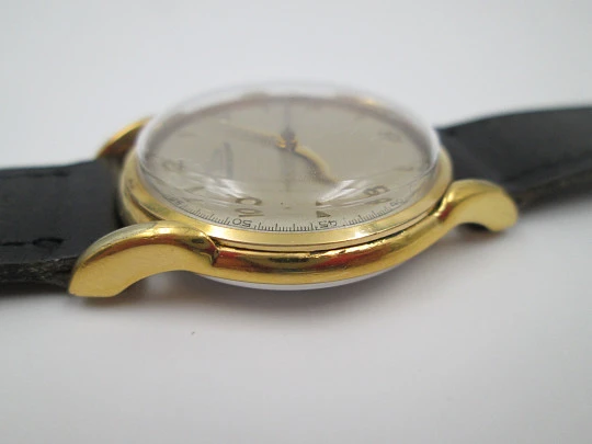 Record. Manual wind. 1960's. Steel & gold plated. Swiss. Leather strap