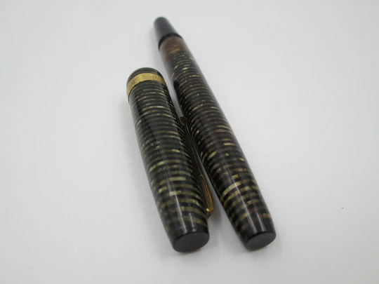 Regia Super fountain pen. Fluted celluloid & gold plated details. 14k gold nib. 1950's