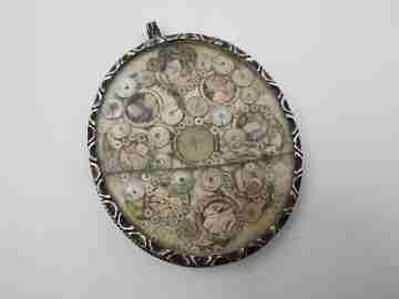 Relicario oval Virgen del Patrocinio (Sevilla). Plata de ley. España. 1870