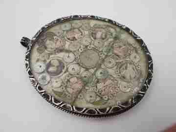 Relicario oval Virgen del Patrocinio (Sevilla). Plata de ley. España. 1870