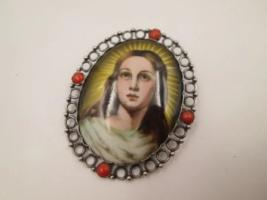 Religious pendant brooch. Silver, porcelain and coral. Radiance Virgin