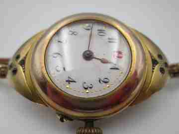 Reloj art decó mujer Chapado en oro. Esfera porcelana y gemas blancas. 1920