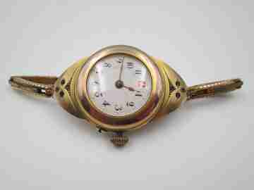 Reloj art decó mujer Chapado en oro. Esfera porcelana y gemas blancas. 1920