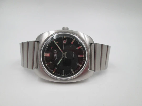 Reloj automático Citizen. Acero inoxidable. Esfera negra. Brazalete. Calendario. 1970